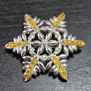 Elegant Silver and Yellow Brooch